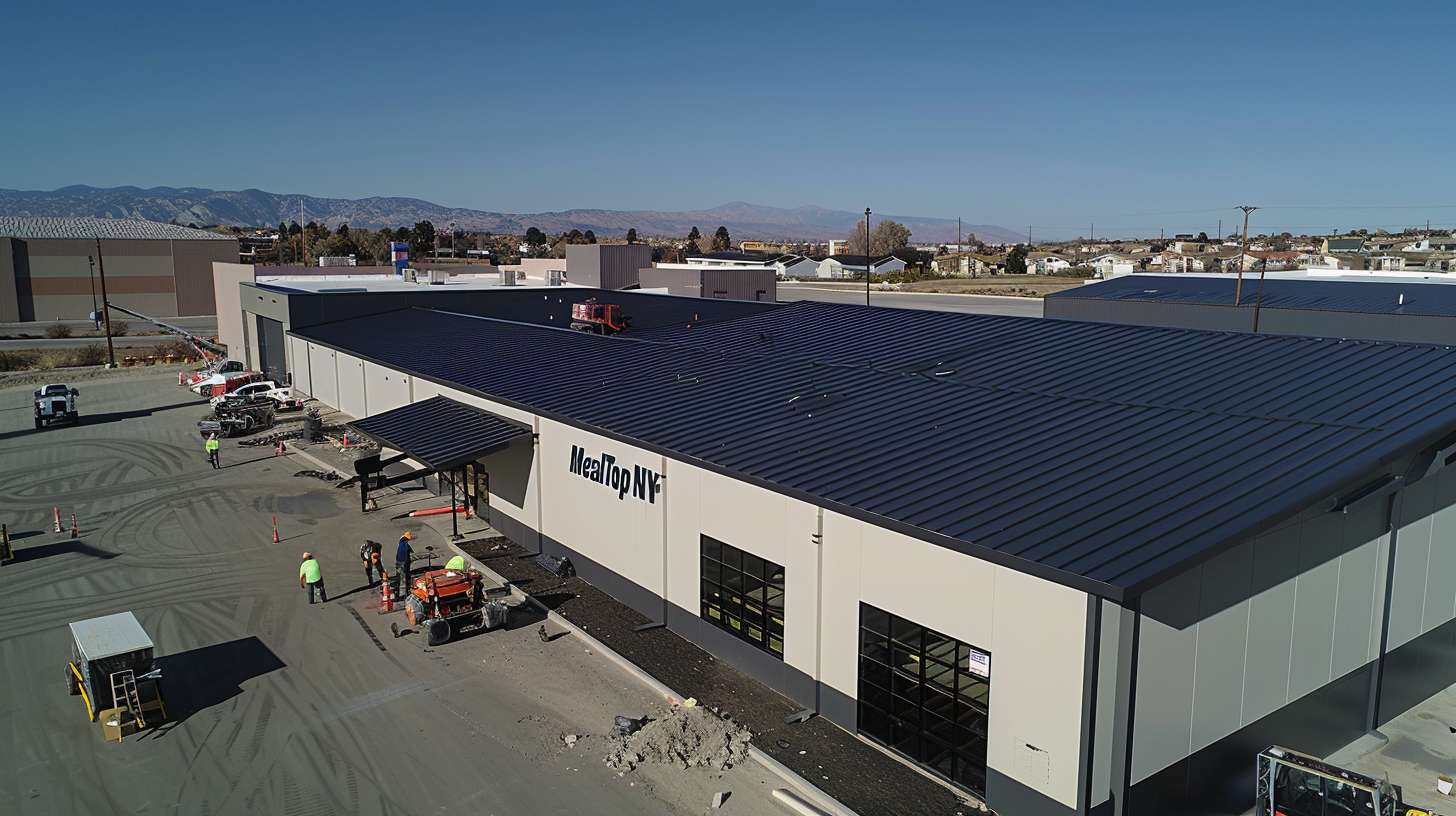 Professional roofer inspecting and repairing flat roof in Manhasset residential area