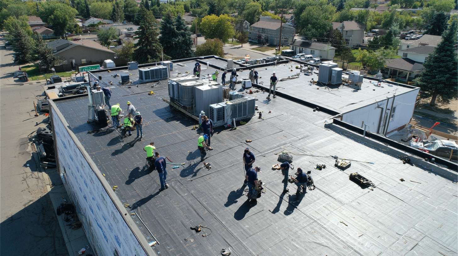 Professional flat roofing installation on commercial building in Plainview, NY